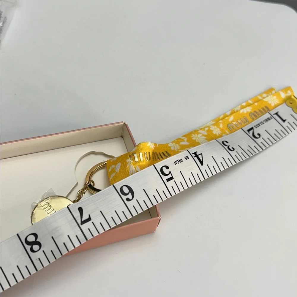 Miu Miu Beaute Yellow Daisy Floral Ribbon Keychain Charm New